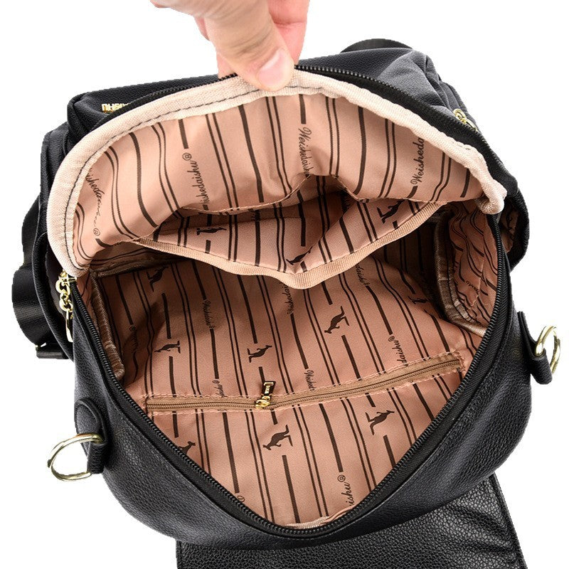 Elegant Leather Backpack with Pendant