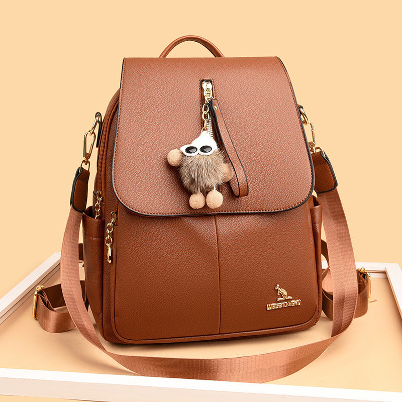 Elegant Leather Backpack with Pendant